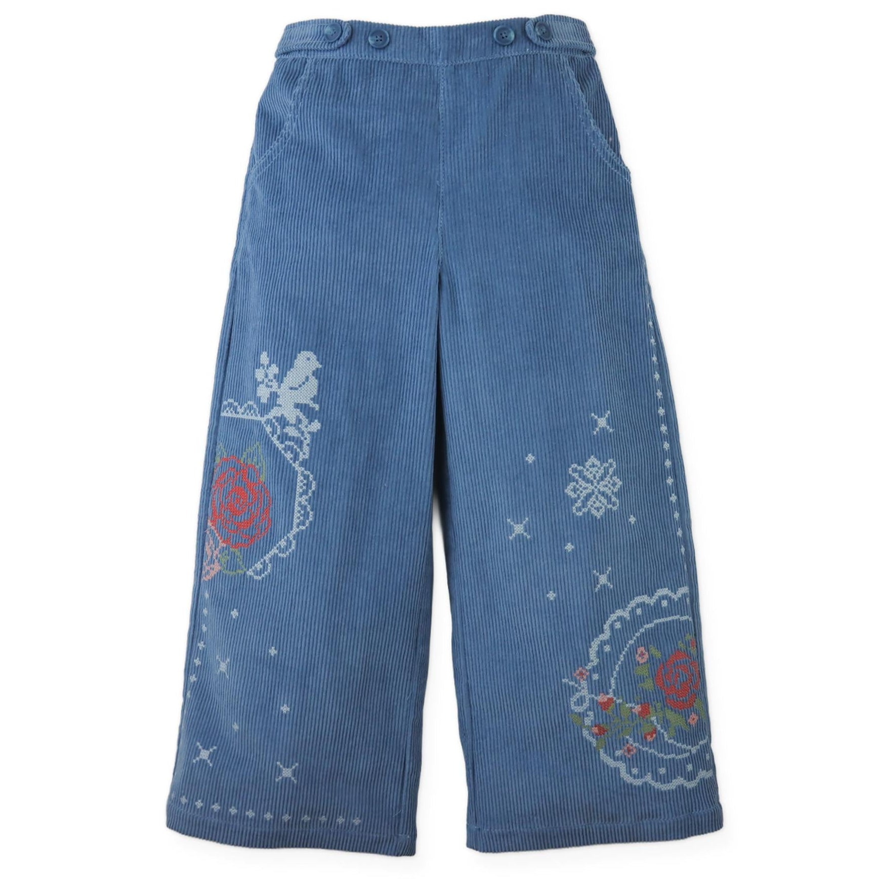Blue corduroy pants with floral embroidery on a white background