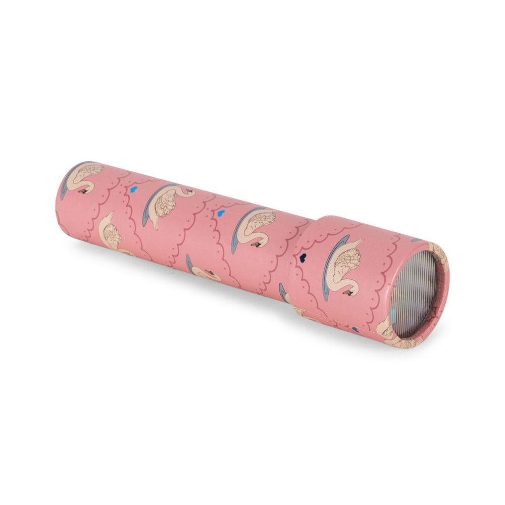 Pink cylindrical toy with swans pattern on a white background